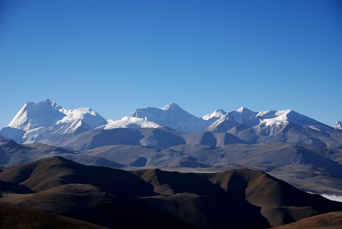 16 Peak 6820 And Other 6000M Peaks South Of The Tong La Peak 6820 and other 6000m peaks are visible to the right of Labuche Kang south of the Tong La.